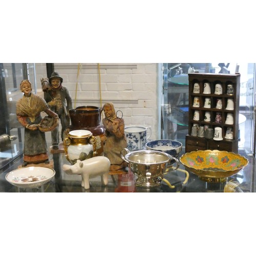 325 - A miniature dresser with twenty thimbles, blue and white cup and saucer, Royal Doulton jug and other... 