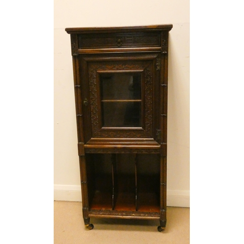 15 - Edwardian mahogany and carved panel music cabinet with glazed door and fitted drawer, 21