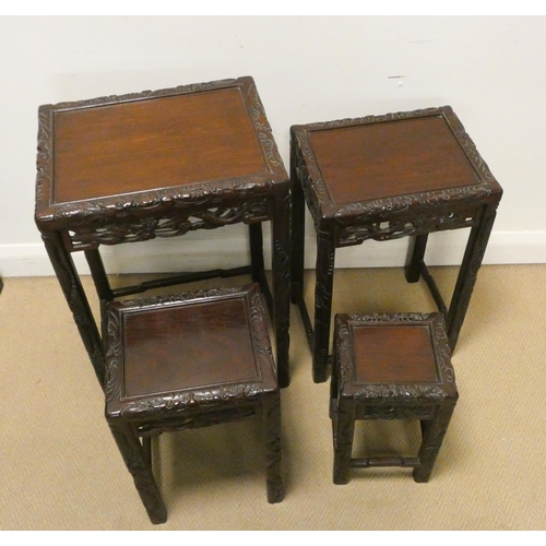 29 - Quartetto nest of Chinese carved hardwood coffee tables