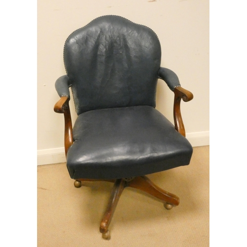 36 - Mahogany revolving desk chair in blue leather