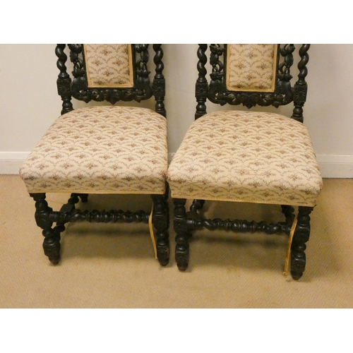 56 - Pair of Victorian carved dark oak barley twist chairs with upholstered seats and back panels