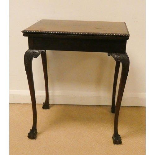 62 - Small mahogany folding top card table with pie crust edge on claw and ball feet, 24