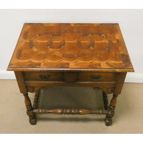 63 - Oak and specimen topped low boy style side table, fitted two drawers, various woods inlaid to the to... 