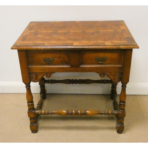 63 - Oak and specimen topped low boy style side table, fitted two drawers, various woods inlaid to the to... 