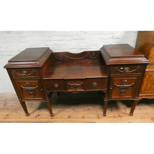 73 - Georgian style mahogany serving sideboard, three drawers and cupboards on reeded legs 74