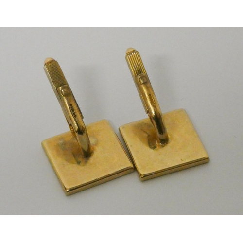 503 - A large square pair of 9ct yellow gold gents cufflinks, hallmarked. Weight 17.3g