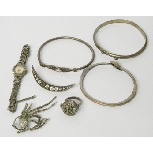 587 - A silver and marcasite cocktail watch, a watch ring, marcasite brooch and a paste set silver crescen... 