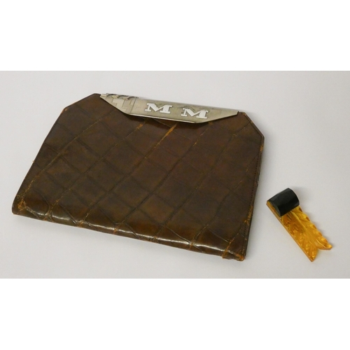 590 - A vintage brown leather evening clutch bag with snap clasp bearing initials MM and an Art Deco Bakel... 