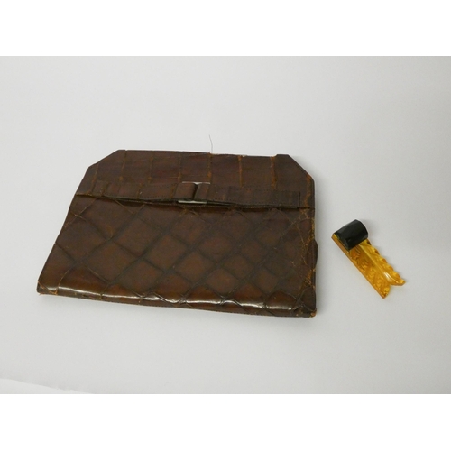 590 - A vintage brown leather evening clutch bag with snap clasp bearing initials MM and an Art Deco Bakel... 