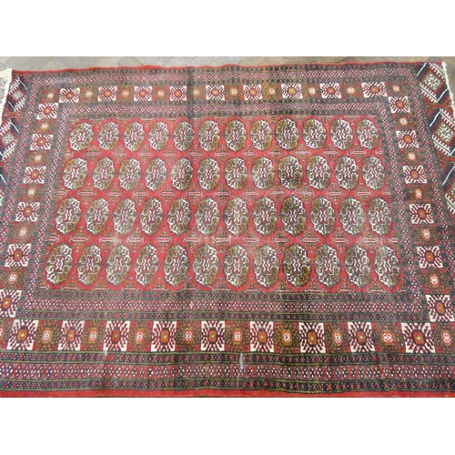 103 - Red Bokhara rug, 6' x 4' approx