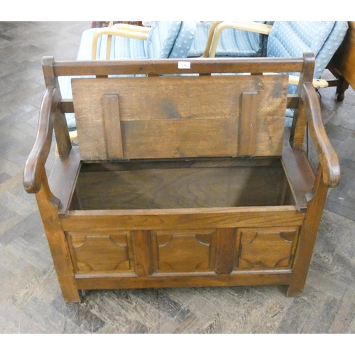 111 - An oak carved lift top hall seat, 34 ½” wide, 18” depth approx