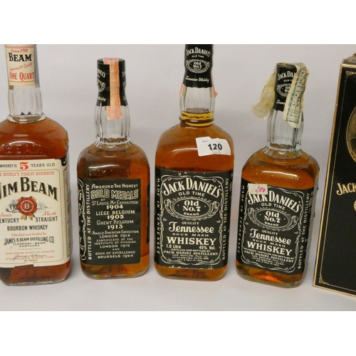 120 - Three bottles of Jack Daniels, bottle of Jim Beam, and a boxed bottle of Jack Daniels Tennessee whis... 