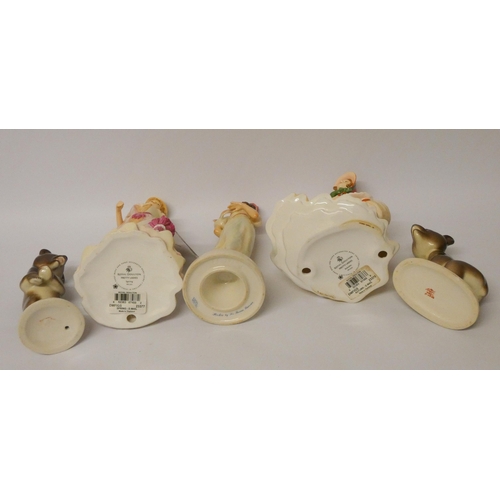 122 - Two Doulton ladies, a Goebel figure and two Russian bears