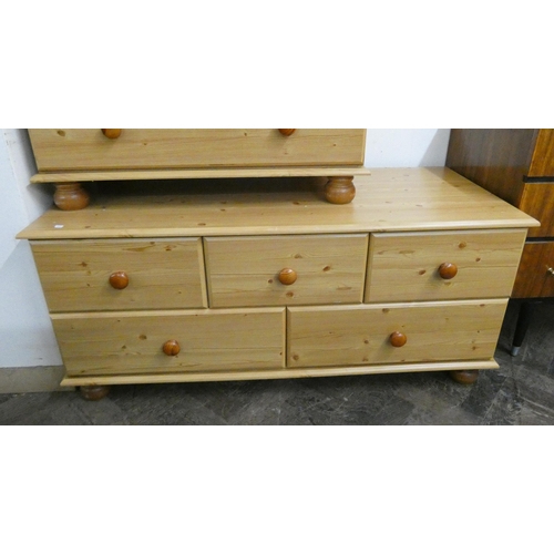 16 - Pine effect chest of two short and three long drawers together with a similar multi drawer chest