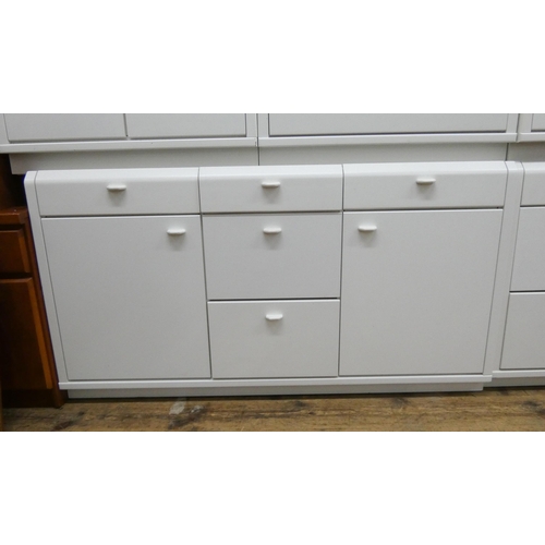 36 - Modern white finished bedroom suite - of various chests of drawers, bedside cabinets and a dressing ... 