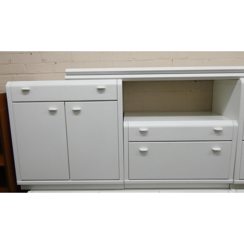 36 - Modern white finished bedroom suite - of various chests of drawers, bedside cabinets and a dressing ... 