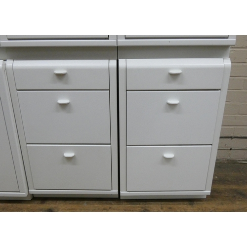 36 - Modern white finished bedroom suite - of various chests of drawers, bedside cabinets and a dressing ... 