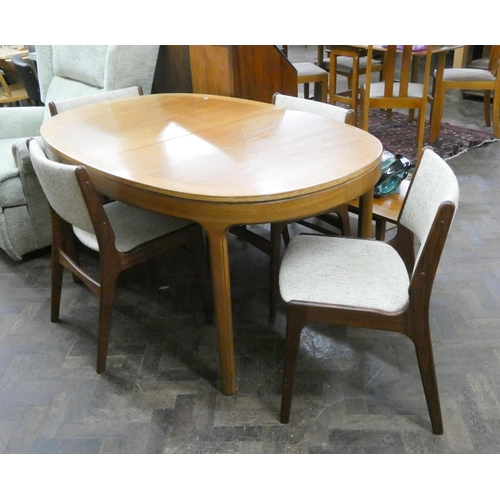 83 - Oval teak extending teak dining table