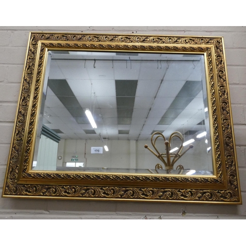 170 - Two bevelled wall mirrors in decorative gilt frames