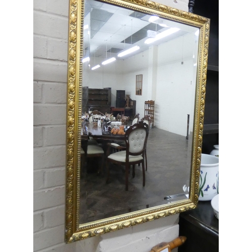 170 - Two bevelled wall mirrors in decorative gilt frames