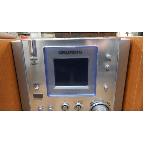 268 - Grundig mini digital radio cassette with speakers and remote