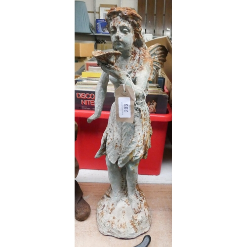 283 - A large cast iron standing fairy figure, 20