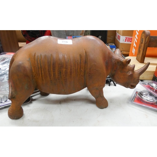 316 - A large heavy (at least 25kg) cast iron Rhinoceros garden ornament