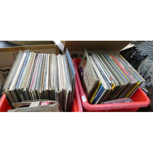 329 - Two boxes of vinyl LP records and some singles - some pop music