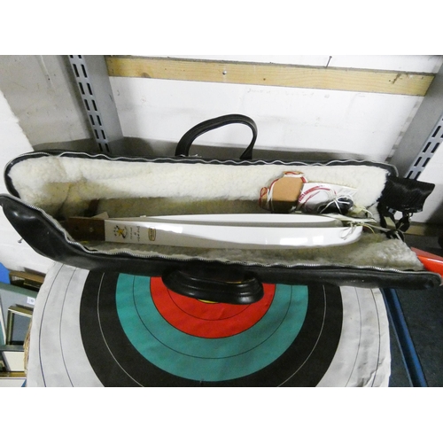 408 - Archery set in leather case and a target