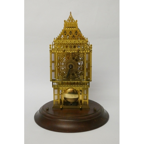 262 - An architectural style brass skeleton clock beneath glazed dome