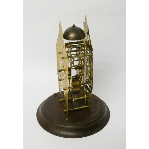 262 - An architectural style brass skeleton clock beneath glazed dome