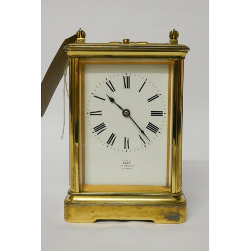 263 - A large brass repeater carriage clock, the white dial signed Dent, The Strand London, height with ha... 