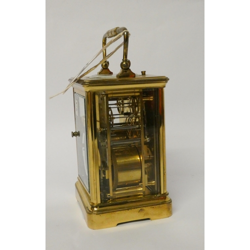 263 - A large brass repeater carriage clock, the white dial signed Dent, The Strand London, height with ha... 