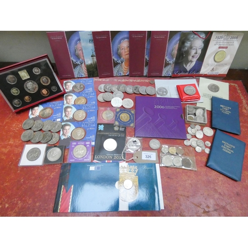 326 - A collection of coins comprising of proof sets, boxed and cased crowns, five pound pieces etc