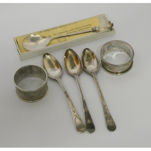 660 - Commemorative silver spoon, three antique silver teaspoons and two silver napkin rings, 3 oz troy