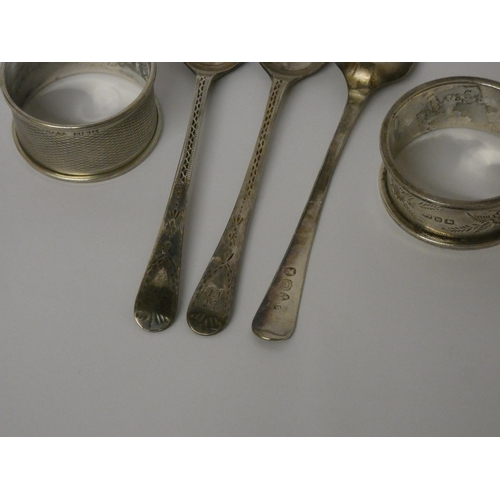 660 - Commemorative silver spoon, three antique silver teaspoons and two silver napkin rings, 3 oz troy