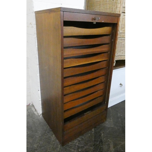 187 - A mahogany shutter front office cabinet with pull out trays