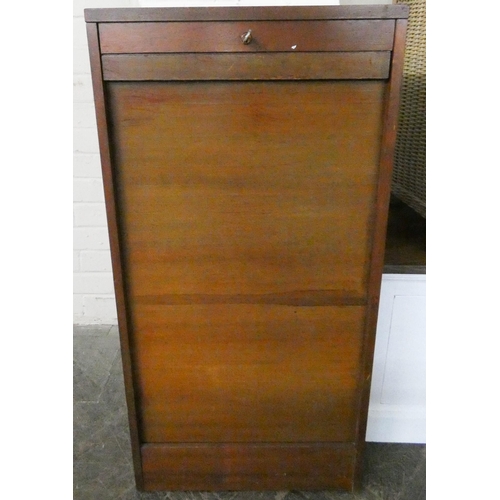 187 - A mahogany shutter front office cabinet with pull out trays