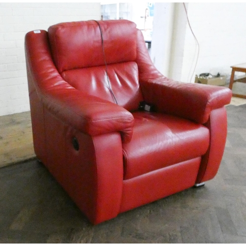 189 - A modern electric reclining easy chair in red leather