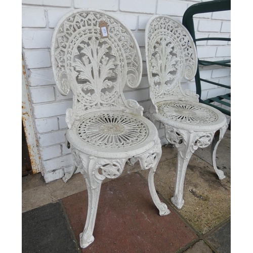 433 - A pair of white painted metal garden chairs