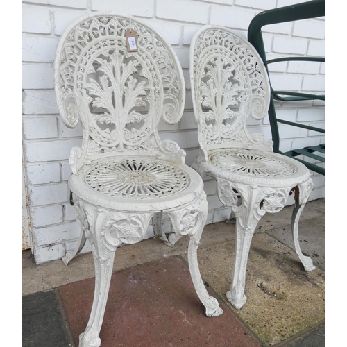 433 - A pair of white painted metal garden chairs