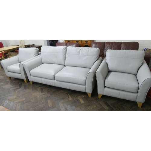 135 - An ex display two seater settee three piece lounge suite in grey leather