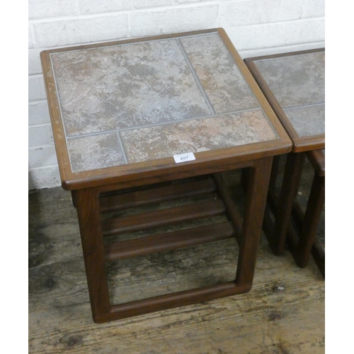 207 - A square teak coffee table with grey patterned tile top with under shelf