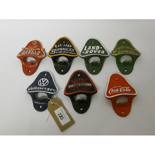 453 - A collection of automotive themed metal bottle openers