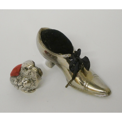 664 - Hallmarked silver novelty chick pin cushion by Sampson Mordan & Co together with a shoe pin cushion