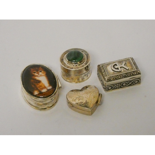 665 - Four modern silver trinket or pill boxes with decorative hinged lids