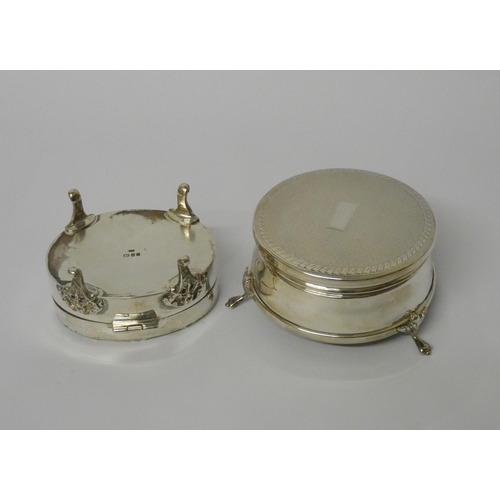 668 - Two hallmarked silver dressing table jewellery boxes with hinged lids