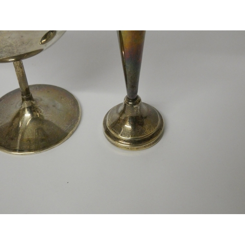 673 - Two silver goblets 5.9 troy ozs and a silver trumpet shaped bud vase on weighted base