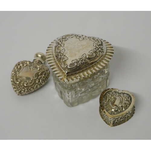 674 - Miniature heart shaped embossed trinket box with hinged lid and gilded interior, heart shaped silver... 