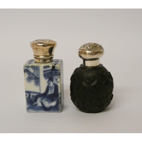 679 - Chinese blue and white porcelain scent bottle and an Irish bog oak scent bottle, both with screw on ... 